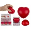 A collage of images showing red heart-shaped stress balls, one being squeezed by a hand, and others in packaging. Náhled obrázku produktu