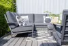 A modern outdoor lounge set on a wooden deck with a striped wall in the background. Produktbild-Vorschau