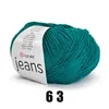 A ball of teal yarn with a label. Produktbild-Vorschau