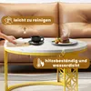 A coffee table with a meal and a cup of coffee on it, with text overlays highlighting features. Produktbild-Vorschau