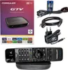 A product shot of a Formuler GTV media streamer, its accessories, and remote control, presented with its packaging. Produktbild-Vorschau