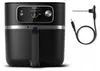 A black Philips air fryer and a meat probe are shown against a white background. Podgląd zdjęcia produktu