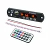 A Bluetooth decoder board, remote control, and connecting wires are laid out on a white background. Produktbild-Vorschau