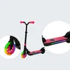 A pink electric scooter with colorful LED lights on the wheels and deck, shown in a studio setting with a light gray background. Anteprima dell’immagine prodotto
