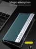 A phone case is shown on a dark surface next to a laptop. Produktbild-Vorschau