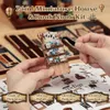 A person's hands are assembling a miniature book nook kit, with instructions and other kit components visible in the background. Náhled obrázku produktu