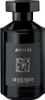 A black perfume bottle with a label. Anteprima dell’immagine prodotto
