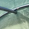 A close-up view of a greenhouse frame and cover. Produktbild-Vorschau