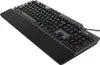 A black gaming keyboard with RGB lighting and a wrist rest, shown from a diagonal angle on a white background. Produktbild-Vorschau