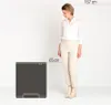 A woman stands next to a dark gray trash can, with dimensions indicated. Náhľad obrázku produktu