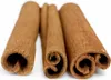 Three cinnamon sticks on a white background. Produktbild-Vorschau