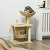 A cat is sitting on a cat tree in a room. Anteprima dell’immagine prodotto