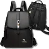 A black leather backpack is shown from the front and back. Voir les images du produit