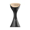 A handheld garment steamer with a black body and a gold steaming head. Podgląd zdjęcia produktu