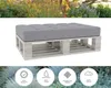 A pallet cushion on a white background, with a blurred garden scene above and below. Voir les images du produit