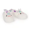 A pair of white unicorn slippers on a white background. Produktbild-Vorschau
