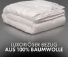 A folded white duvet or comforter is shown against a gray background, with text overlayed at the bottom. Produktbild-Vorschau