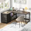 A home office setup with an L-shaped desk, chair, and a bed in the background. Anteprima dell’immagine prodotto