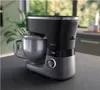 A kitchen mixer is shown on a countertop in a kitchen setting. Náhľad obrázku produktu