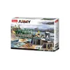 A box of Sluban Army building blocks depicting a winter battle scene with a bridge and soldiers. Produktbild-Vorschau