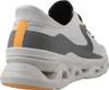 A rear view of a gray and white Skechers sneaker. Voir les images du produit