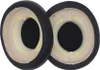 Two black ear pads for headphones are shown from a top-down perspective against a white background. Voir les images du produit