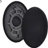 A pair of black ear pads for headphones, with one pad detached and showing its internal structure. Produktbild-Vorschau