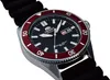 A close-up, angled shot of an Orient Mako III automatic men's watch with a black dial, red bezel, and black rubber strap, set against a white background. Náhled obrázku produktu