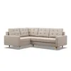 A beige sectional sofa with tufted cushions is shown against a white background. Produktbild-Vorschau