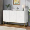 A white sideboard with a geometric pattern on the doors, set on a gold metal frame, displayed in a room with a painting and a lamp on top. Anteprima dell’immagine prodotto