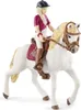 A toy figurine of a girl riding a white horse. Náhľad obrázku produktu