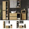 A modern bathroom vanity set with a sink and storage cabinets against a dark tiled wall. Produktbild-Vorschau