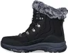 A black winter boot with gray fur trim is shown against a white background. Voir les images du produit