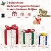 Three illuminated Christmas gift boxes of different sizes are displayed with measurement indicators and decorative elements. Produktbild-Vorschau