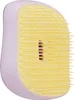A lilac and yellow hairbrush. Produktbild-Vorschau
