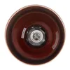 The inside of a copper-finished lamp shade, showing the bulb socket. Produktbild-Vorschau