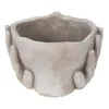 A close-up studio shot of a planter shaped like cupped hands holding a bowl. Náhled obrázku produktu