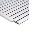A close-up, angled view of a white wooden trim piece with black slats, likely an accessory for acoustic wall panels. Produktbild-Vorschau