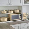 A kitchen shelf displaying kitchenware and appliances. Náhled obrázku produktu