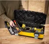 A person is holding a tool tray from an open toolbox. Anteprima dell’immagine prodotto