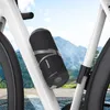 A black speaker is attached to the frame of a white bicycle, with a mountain landscape in the background. Náhľad obrázku produktu