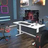 A gaming setup with a height-adjustable desk, computer, chair, and gaming-themed decor. Podgląd zdjęcia produktu
