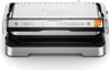 A front-on studio shot of a silver and black electric grill. Voir les images du produit