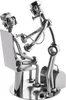 A metal sculpture of a doctor examining a patient. Anteprima dell’immagine prodotto