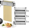 A pasta maker with multiple attachments and a plate of pasta. Náhľad obrázku produktu