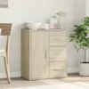 A sideboard with a door and drawers is shown in a room with a chair and a plant. Anteprima dell’immagine prodotto