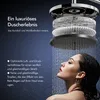 A woman is showering under a modern showerhead, with text describing the shower experience. Podgląd zdjęcia produktu