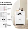 A white corner cabinet with two doors and open shelving, decorated with toiletries and tissues. Anteprima dell’immagine prodotto