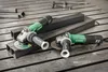 Two angle grinders are placed on a metal surface with metal bars. Anteprima dell’immagine prodotto