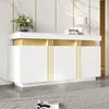 A modern white sideboard with gold accents and a marble-effect top, placed against a marble-patterned wall. Anteprima dell’immagine prodotto